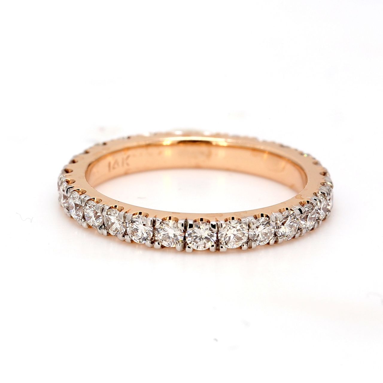 Eternity band in 18K RG with U-prong set (32) round diamonds.  D0.80ct.t.w.  Size 6