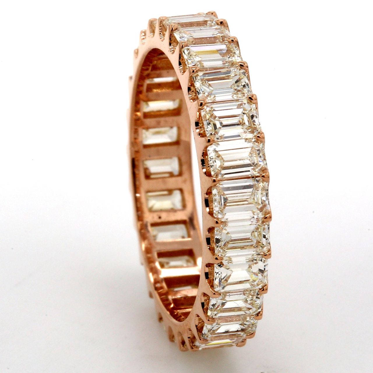 Eternity band in 18K RG with U-prong set (26) emerald cut diamonds.  D2.68ct.t.w.  Size 5.5