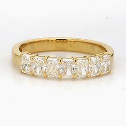 7-stone band in 18K YG with basket prong set radiant cut diamonds.  D1.03ct.t.w.  Size 5.5