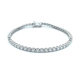7' Tennis bracelet with illusion head 4-prong set (54) round diamonds.  D3.07ct.t.w.