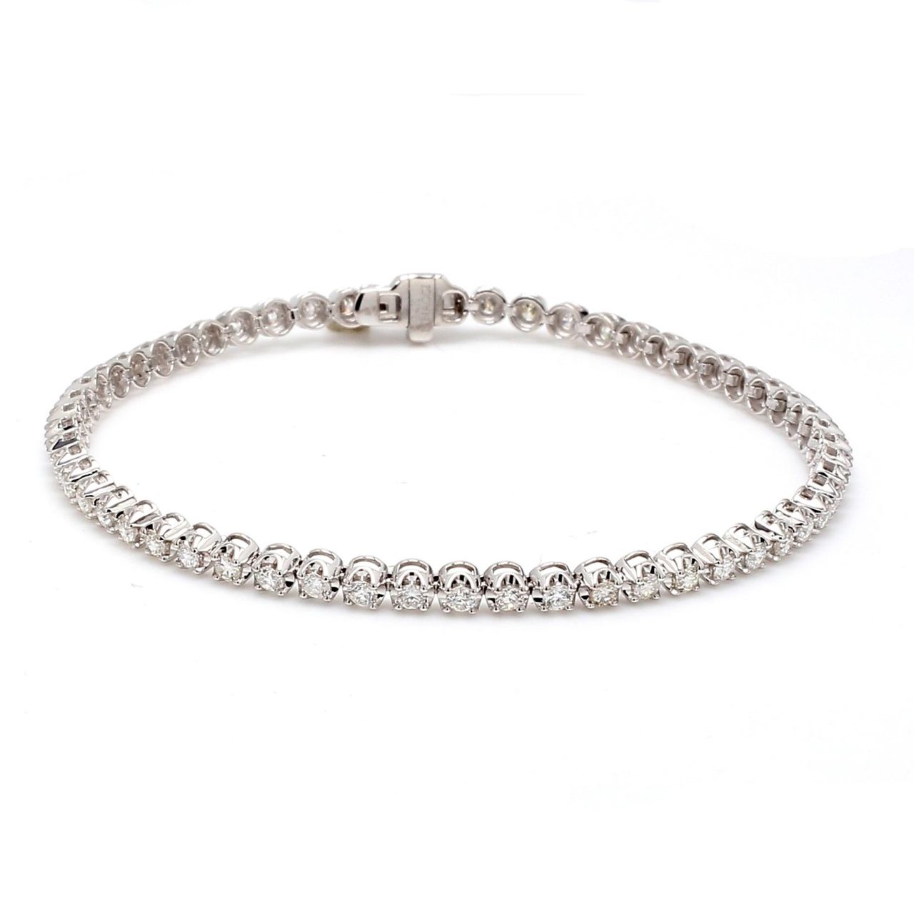 7' Tennis bracelet with crown head prong set (56) round diamonds.  D1.95ct.t.w.