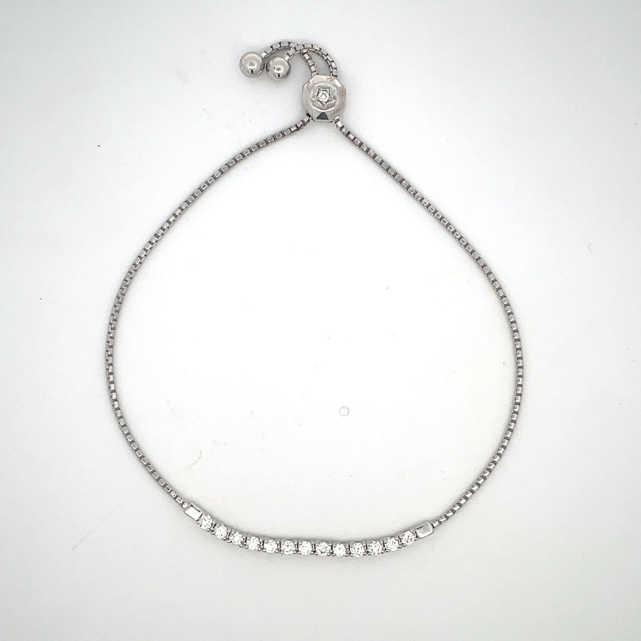 Bolo style bracelet with basket prong set (15) round diamonds.  D0.50ct.t.w.