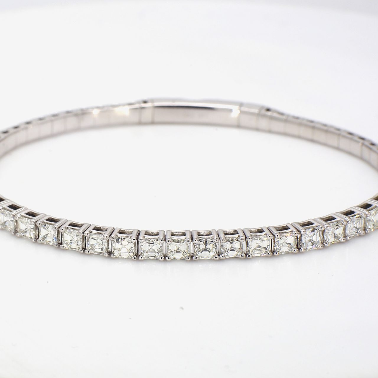 Flex bangle with basket prong set (27) asscher cut diamonds.  D4.10ct.t.w.