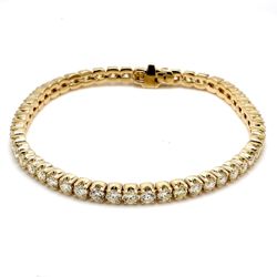 7' Tennis bracelet with 4-prong set (50) round diamonds.  D7.29ct.t.w.