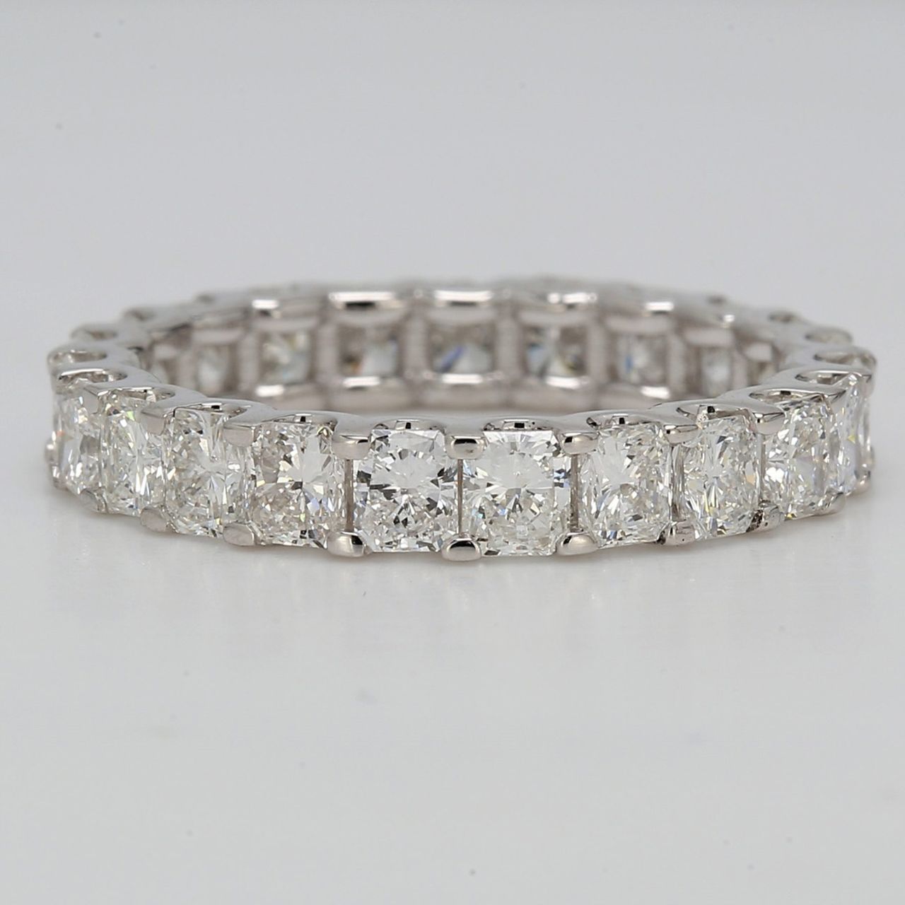 Eternity band with shared U-prong set radiant diamonds.  D3.49ct.t.w.  Size 7.25