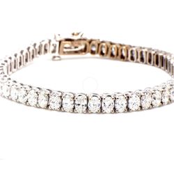 7' Tennis bracelet with 4-prong set (51) oval cut diamonds.  D11.16ct.t.w.