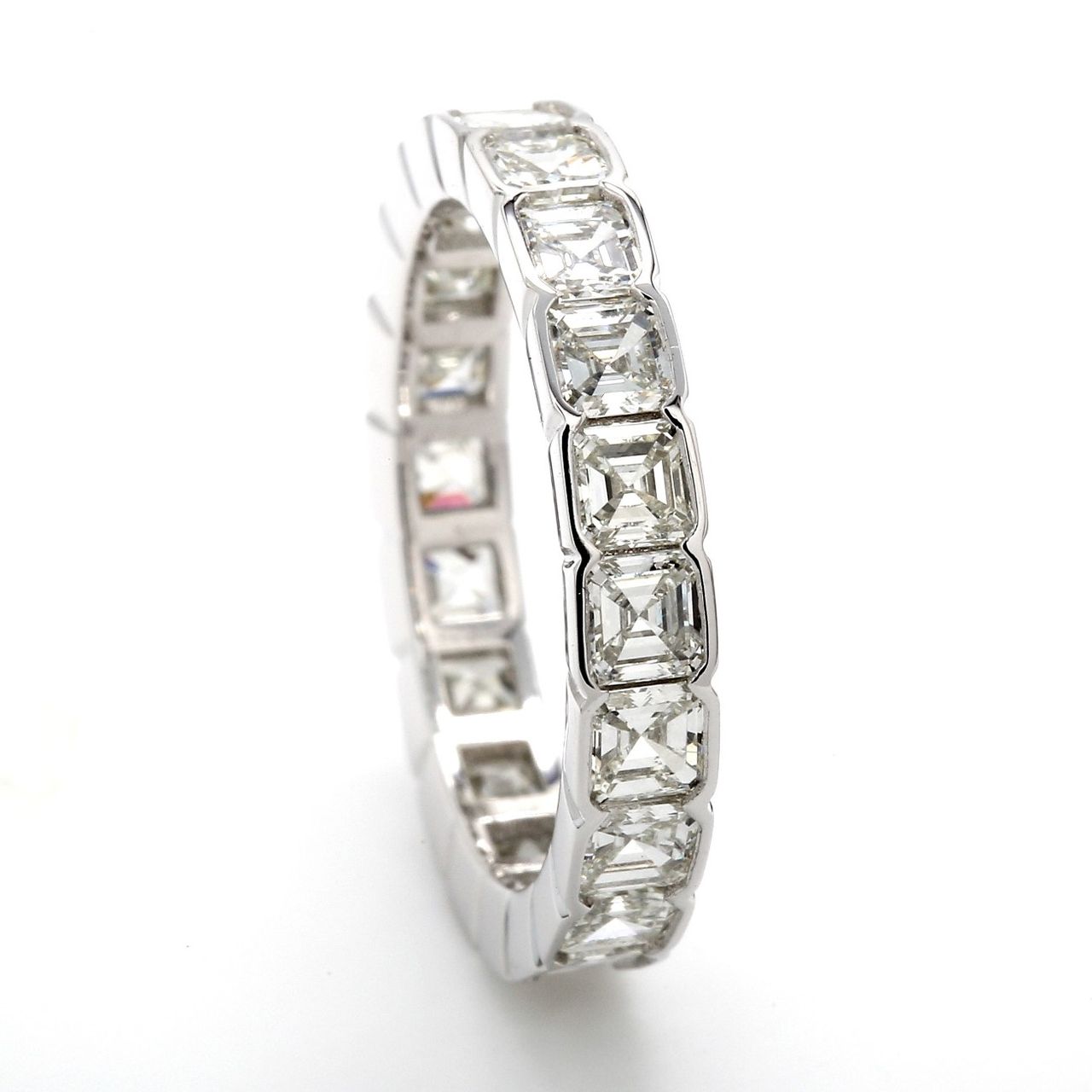 Eternity band in platinum with bezel set asscher cut diamonds.  D2.90ct.t.w.  Size 5.75