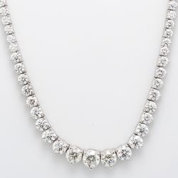 Graduated tennis necklace with 3-prong set round diamonds.  D12.44ct.t.w.