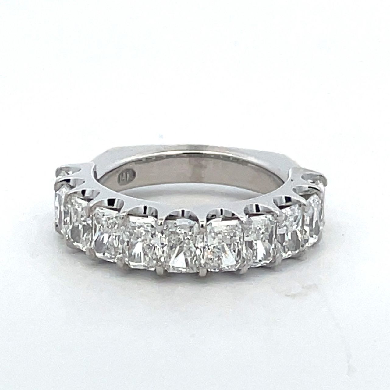 Single row euro shank band with U-prong set (11) radiant cut diamonds.  D2.87ct.t.w. Size 5.5