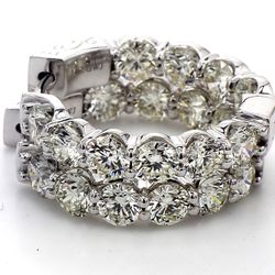 0.75' Inside out hoop earrings with prong set (20) round diamonds.  D6.71ct.t.w.