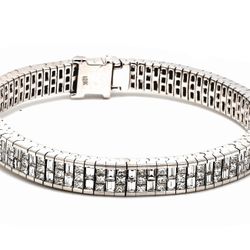 Bracelet in 18K WG w/ invisible set combination of 3-row princess cuts & 2-row baguette diamonds.  D10.91ct.t.w.