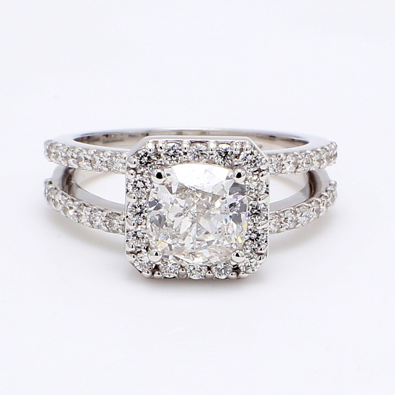 Halo split-shank semi-mount with pre-set round diamonds.  D0.89ct.t.w.  Size 6