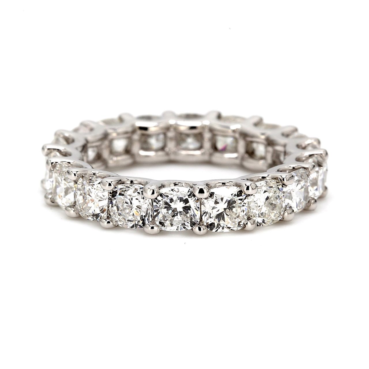 Eternity band in platinum with U-prong set (18) cushion cut diamonds.  D5.54ct.t.w.  Size 6
