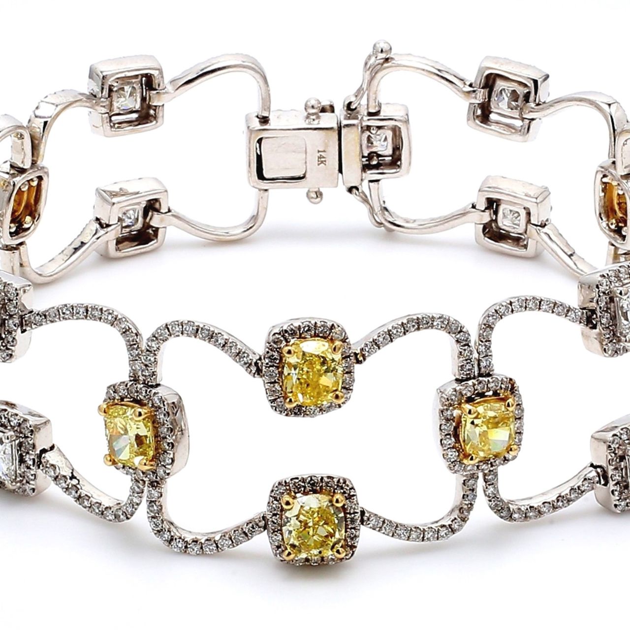 7' Designer bracelet with rounds, princess cuts, & fancy yellow cushion diamond centers.  D12.91ct.t.w.  Fancy Yellow 6.05ct.t.w.