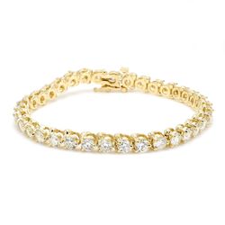 7' Tennis bracelet in yellow gold with 3-prong set (35) round diamonds.  D9.50ct.t.w.