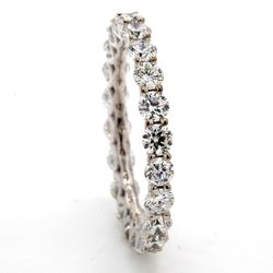 Eternity band in 18K WG with U-prong shaped (22) round diamonds.  D1.66ct.t.w.  Size 5.5