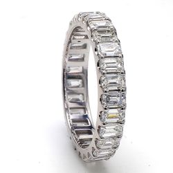 Eternity band in platinum with U-prong set (27) emerald cut diamonds.  D2.51ct.t.w.  Size 6
