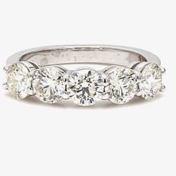 5-stone band in platinum with basket prong set round diamonds.  D1.92ct.t.w.  Size  6
