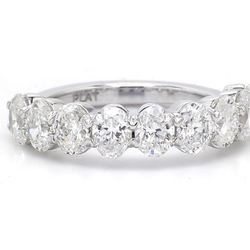 9-stone band in platinum with basket prong set oval cut diamonds.  D2.06ct.t.w.  Size 5.5