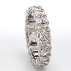 Eternity band in platinum with basket claw prong set F/VS (21) radiant cut diamonds.  D5.07ct.t.w.  Size 6