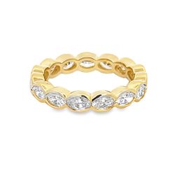 Eternity band east west style in 18K YG with bezel set (15) oval diamonds.  D2.28ct.t.w.  Size 5.75