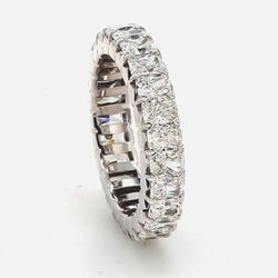 Eternity band in 18K WG with prong set (25) radiant cut diamonds.  D3.71ct.t.w.