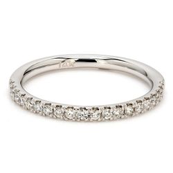 Band with shared prong set (19) round diamonds.  D0.25ct.t.w.  Size 7