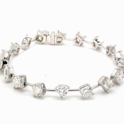 7' Bracelet in platinum with prong set multi fancy shape diamonds.  D12.04ct.t.w.