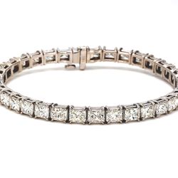 6' Tennis bracelet east to west style with basket prong set (35) radiant cut diamonds.  D10.78ct.t.w.