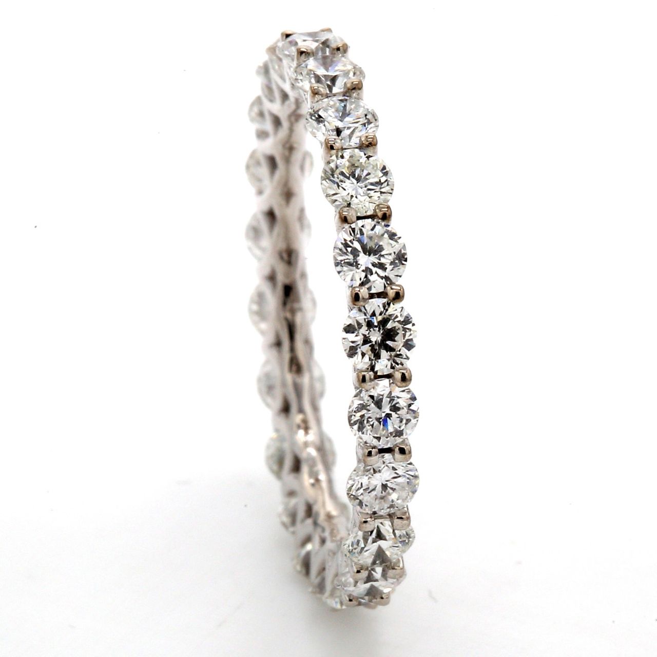 Eternity band in 18K WG with U-prong shaped (22) round diamonds.  D1.66ct.t.w.  Size 5.5