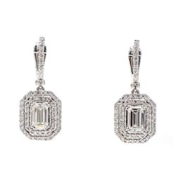 Halo drop earrings with prong set rounds around GIA certified I-J/VVS1 emerald cut diamond centerstones.  D2.95ct.t.w.