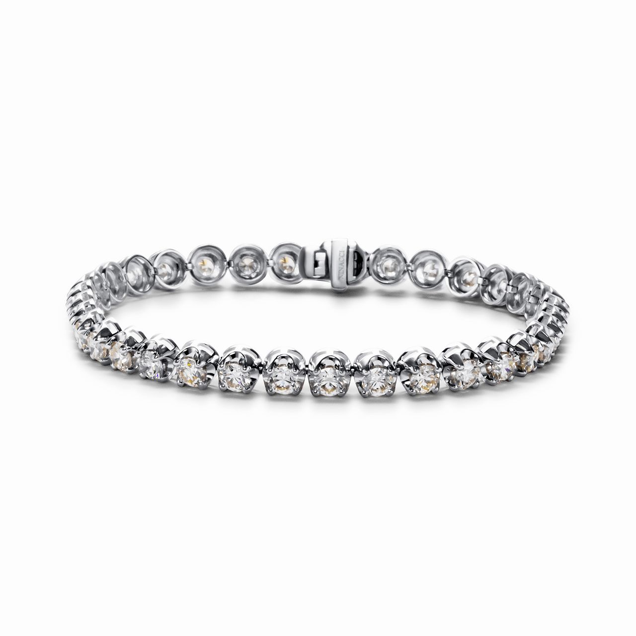 7' Tennis bracelet with crown head style 4-prong set (34) round diamonds.  D6.35ct.t.w.