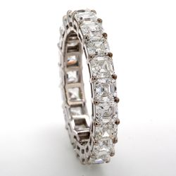Eternity band in 18K WG with basket prong set (21) asscher cut diamonds.  D4.19ct.t.w.  Size 6.75