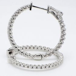 1.25' Inside out hoop earrings with U-prong set (58) round diamonds & with special spring lock.  D5.03ct.t.w.