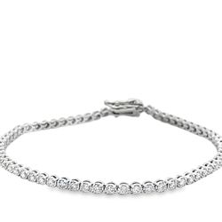 7' Tennis bracelet with illusion set (64) round diamonds.  D1.64ct.t.w.