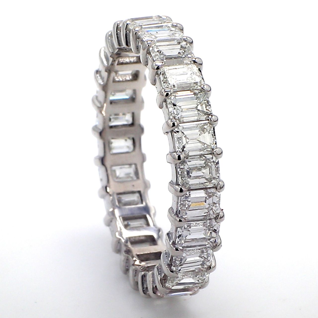 Eternity band in platinum with prong set (26) emerald cut diamonds.  D3.52ct.t.w.  Size 7.25