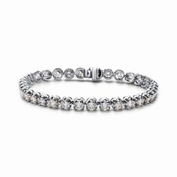 7' Tennis bracelet with crown head style 4-prong set (34) round diamonds.  D6.35ct.t.w.