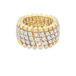 Flexible eternity band in 18K YG with prong set round diamonds.  D2.93ct.t.w.