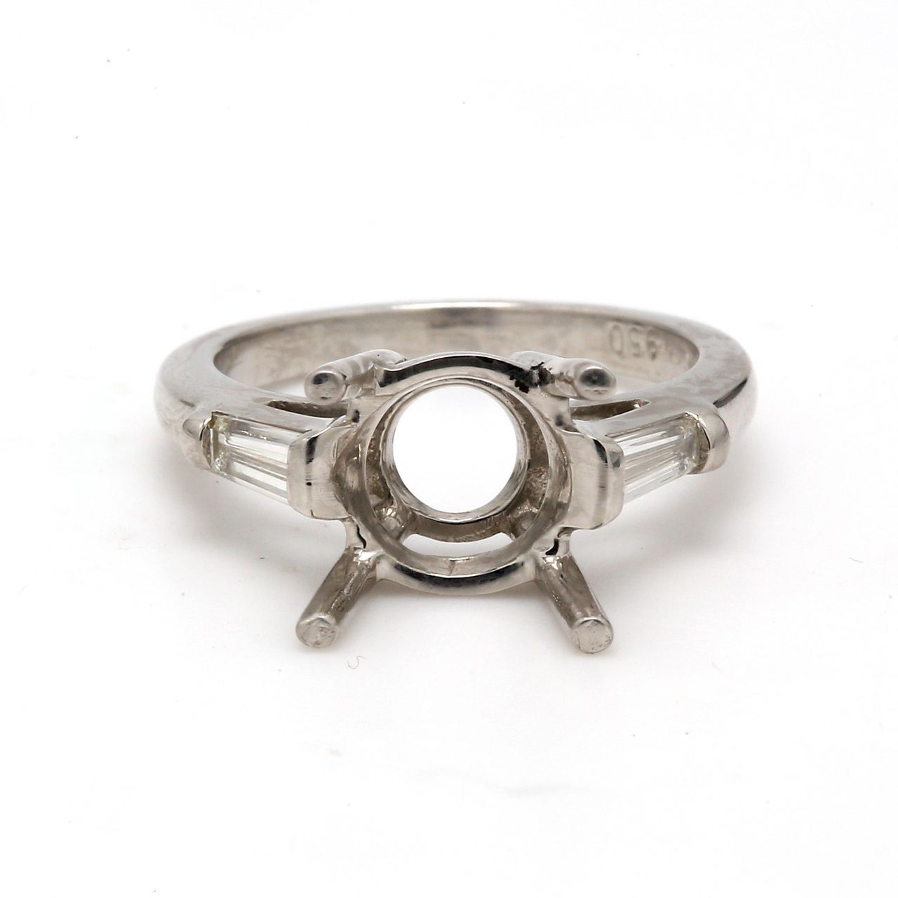 3-stone semi mount in platinum with baguette diamond sides.  D0.42ct.t.w.