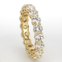 Eternity band in 18K YG with basket prong set (18) round diamonds.  D3.44ct.t.w.  Size 6