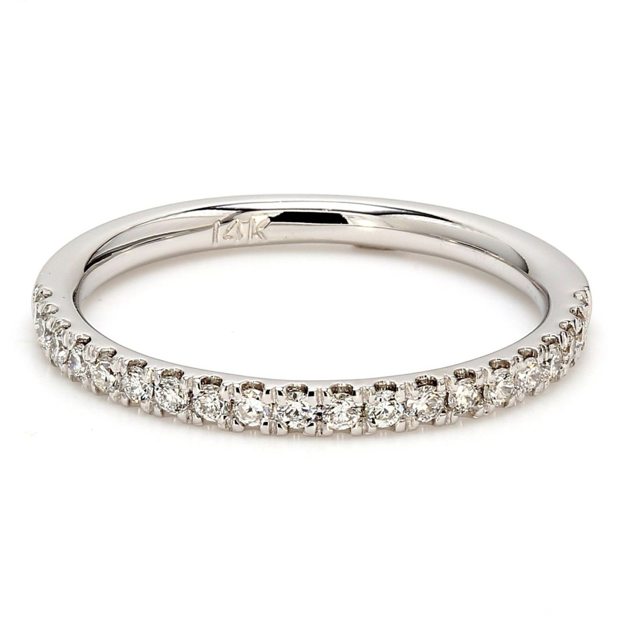 Band with shared prong set (19) round diamonds.  D0.25ct.t.w.  Size 7