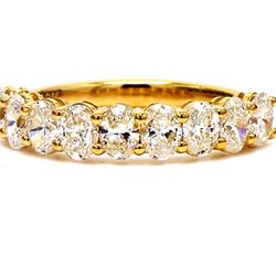 9-stone band in 18K YG with basket prong set oval cut diamonds.  D1.69ct.t.w.  Size 7.25