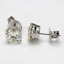 Push back stud earringswith 4-prong set USA certified H-I/SI1-SI2 round diamonds.  D3.03ct.t.w.