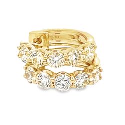Halfway hoop earrings in yellow gold with prong set round diamonds.  D2.08ct.t.w.