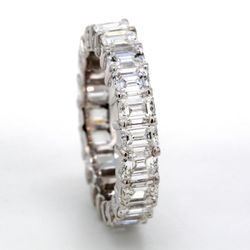 Eternity band with shared prong set F/VVS-VS (22) emerald cut diamonds.  D4.57ct.t.w.  Size 5.5