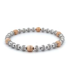 Flex bangle in 18K two-tone with pave set round diamonds.  D2.02ct.t.w.