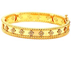 Bangle in 18K YG with prong set round diamonds.  D0.84ct.t.w.
