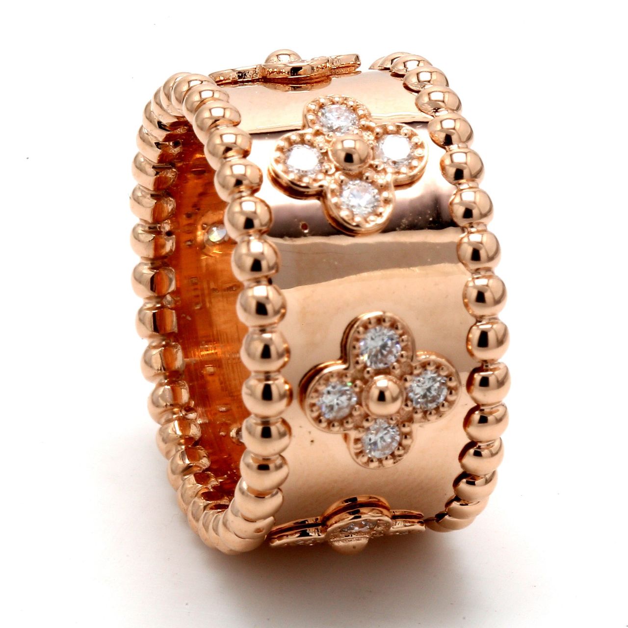 Flower ring in 18K RG with bezel set (24) round diamonds.  D0.60ct.t.w.  Size 6.25