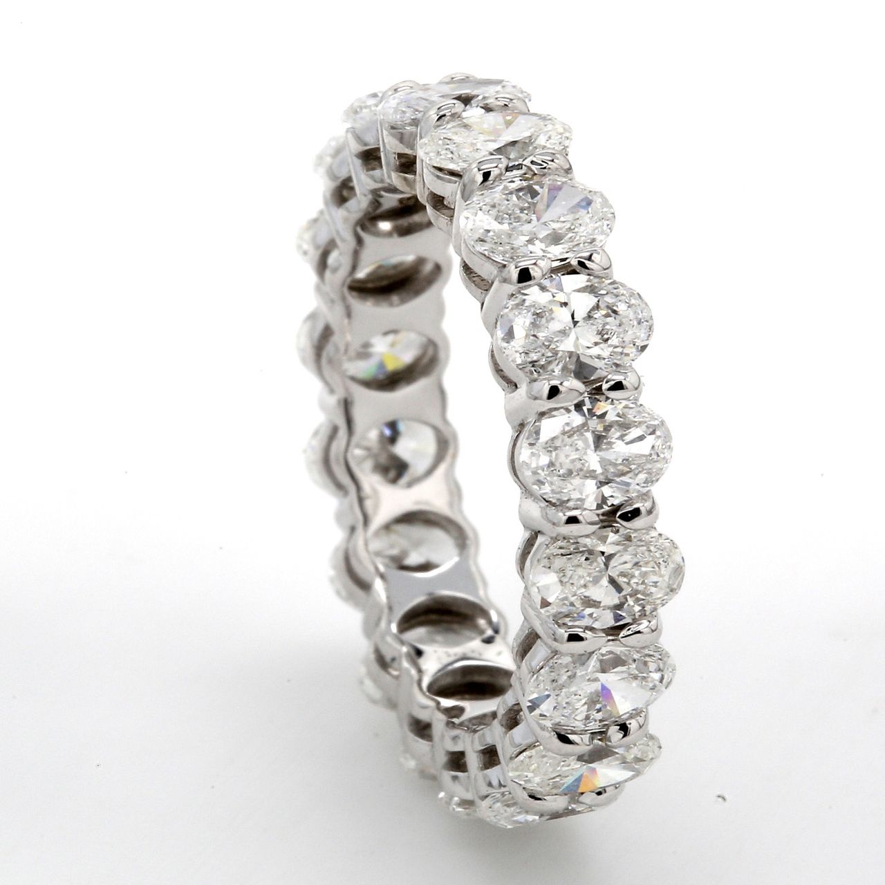 Eternity band in 18K WG with basket prong set (18) oval diamonds.  D2.84ct.t.w.  Size 5