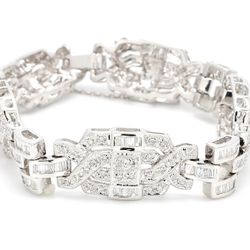 Antique style bracelet in 18K WG with round & baguette diamonds.  D4.30ct.t.w.